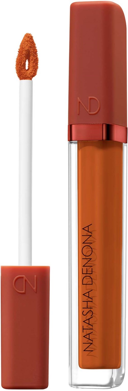 Lippenstiftrohr mit orange Farbe und weißem Applikator. Text auf der Röhre sagt Natasha Denona.