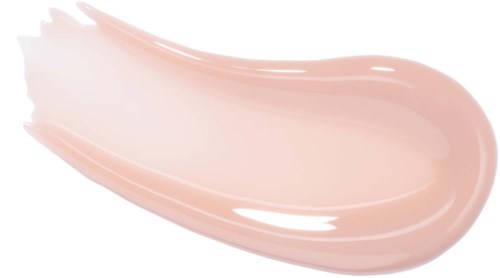 Lys rosa hudpleieprodukt smurt i en glatt, buet strek.