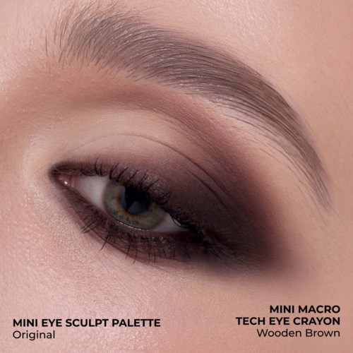 Närbild av ett öga med smoky eye-smink i bruna och beige nyanser.