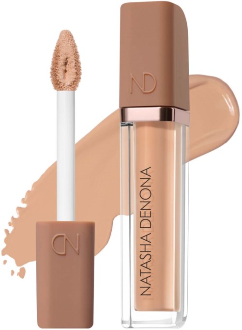 Läppglansrör med beige lock och applikator, swatchad på bakgrund, märkt Natasha Denona.