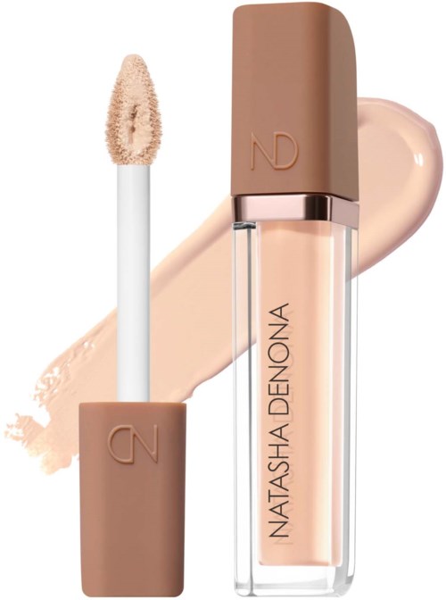 Läppglans i beige nyans med applicator, framför en färgad sväm.