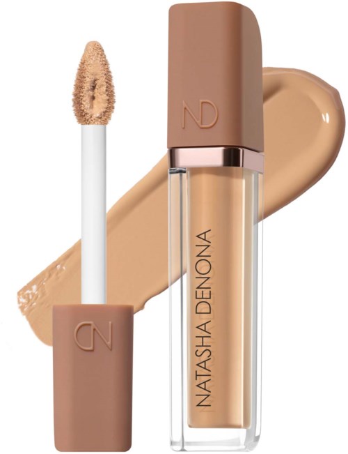 Läppglans i klar flaska med beige lock, märkt Natasha Denona, med glob av gloss bakom.