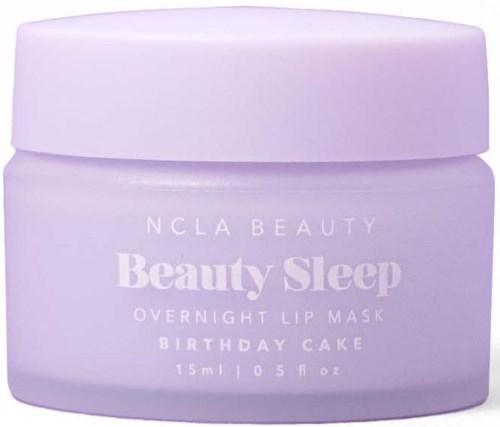 Ein lilafarbener Behälter mit 'Beauty Sleep' für Lippen, mit Geburtstagskuchen-Duft, kleines Volumen und schlichtem Design.