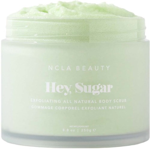 Grüner Körperscrub in einem weißen Behälter, labeled 'Hey, Sugar' für natürliche Hautpeeling. 8,8 oz.