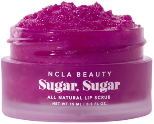 A pink jar of all natural lip scrub called Sugar, Sugar by NCLA Beauty, with scrub on top.