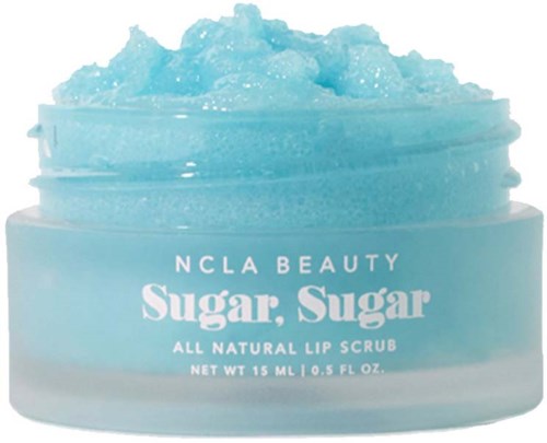 A light blue lip scrub in a round container, with textured, sugary-looking substance inside.