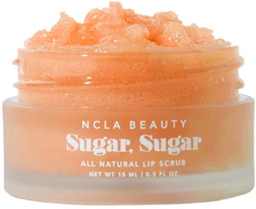 Orange lip scrub with a creamy texture, labeled as natural, from NCLA Beauty, called Sugar, Sugar.