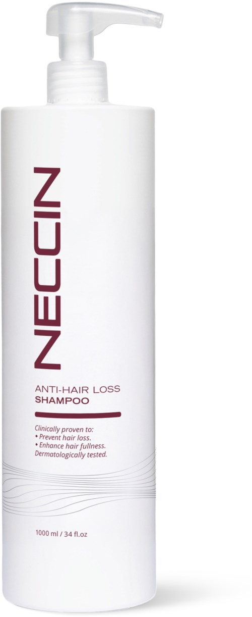 Een witte fles Neeccin anti-haaruitval shampoo met pomp.