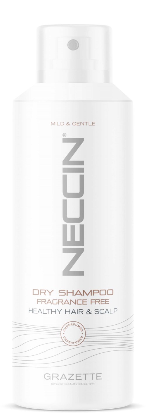 Een witte fles Neccin droogshampoo met spraydop, gelabeld als parfumvrij en voor gezond haar en hoofdhuid.
