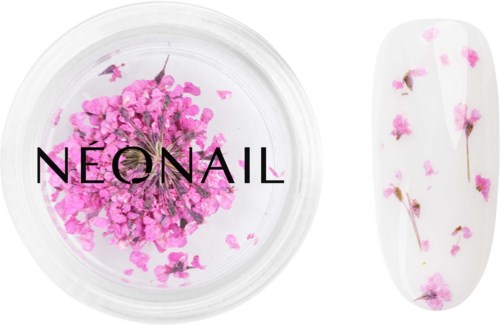 A small container with pink flower flakes and a nail sample with the same pink flowers. The word "NEONAIL" is on the container.