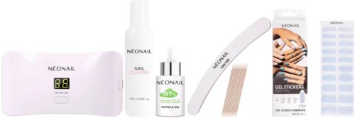Nail care kit includes a digital lamp, nail cleanser, cuticle oil, nail strip, and gel stickers.