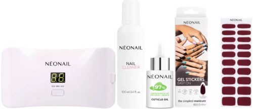 A nail care kit including a device, cleaner, gel stickers, and nail polish for easy nail beautification.