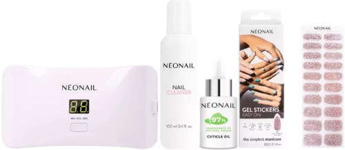 Skincare kit includes a device, nail cleaner, cuticle oil, gel stickers, and a display with 8.8 reading.