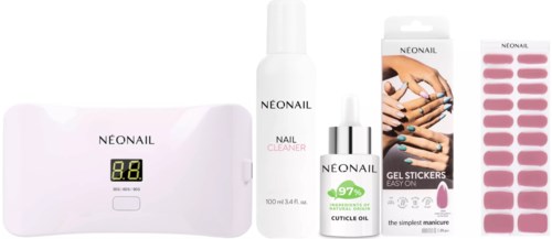 Set of nail care products including a lamp, cleaner, cuticle oil, gel stickers, and a nail scanner.