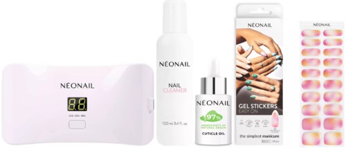 Manicure kit includes LED lamp, nail cleaner, cuticle oil, gel stickers, and nail polish.