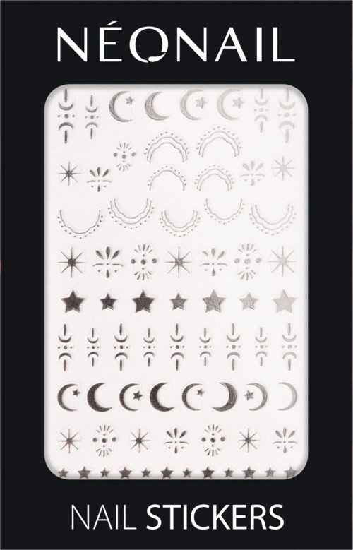 A black box shows white nail stickers with moon, star, arc, and sun designs, arranged in rows.