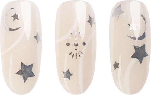 Nail art with stars, moons, and a cute animal face design on a light background.