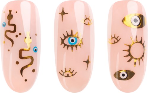 Nail art with gold and blue eye designs, stars, and wavy patterns on pink nails.