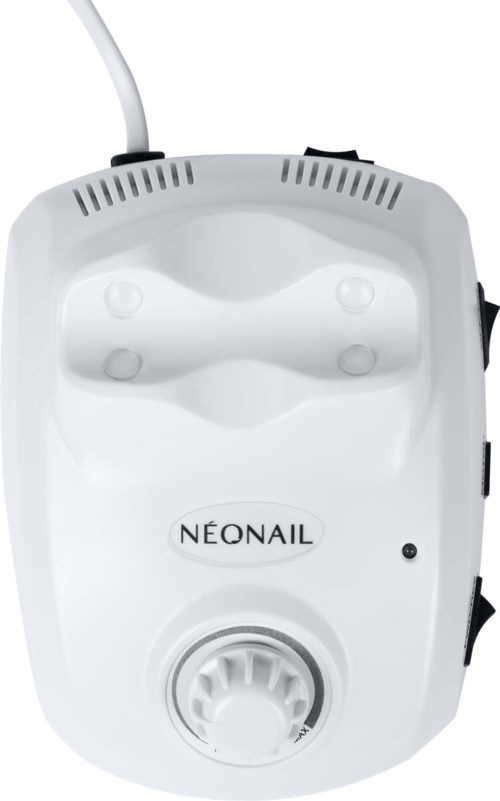 A white device labeled 'NÉONAIL' with buttons and a dial, likely used for nail curing or beauty treatments.