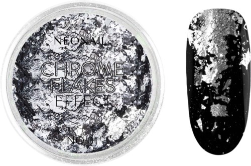 Ein Nagellackbehälter mit schwarz-weißer Sprenkelgestaltung und eine Nagel mit ähnlichem Effekt.