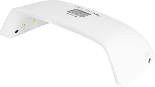 A white LED nail lamp with a curved shape, digital display, and yellow and black buttons on the side.