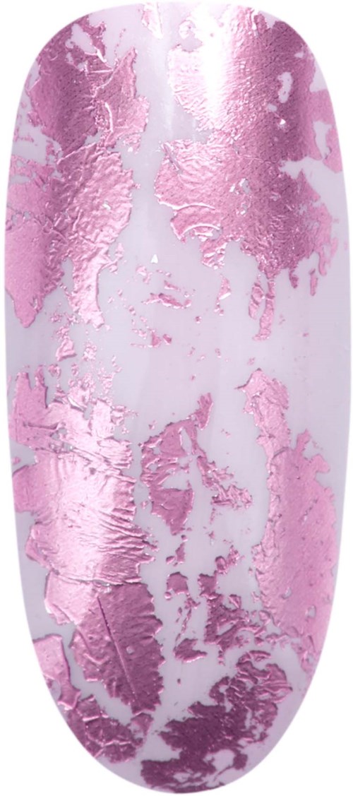 A long oval object with pink and white peeling paint or foil. The surface looks textured and worn.