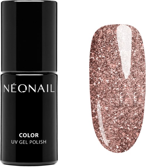 Black nail polish bottle and a glittery pink nail with shiny coat applied.