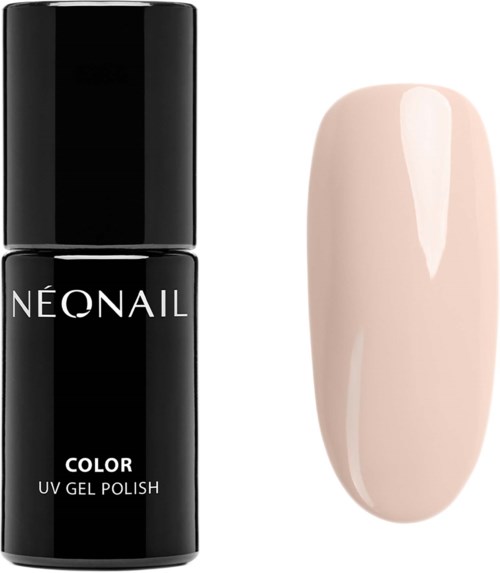 En svart flaska med Neonail UV-gel nagellack bredvid en krämfärgad målad nagel.