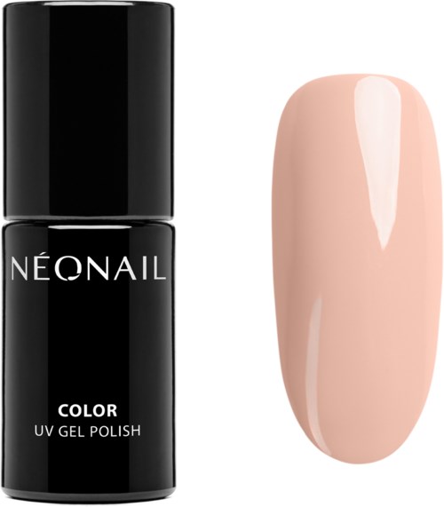 A black bottle of neon nail polish next to a light pink painted nail sample.