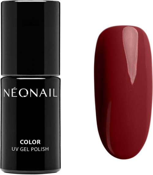 En flaska med Neonaill UV-gel tillhörande nagellack bredvid en nagel målad i mörkrött.