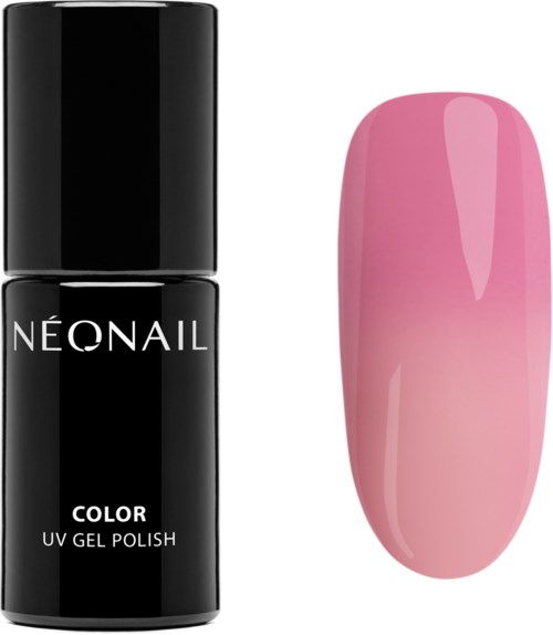 Black and pink nail polish bottles with a painted pink nail swatch next to them.