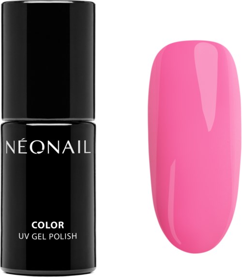A black nail polish bottle and a pink nail painted nail tip.