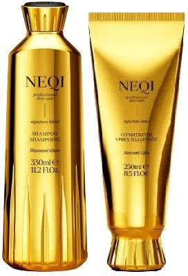 Zwei goldene Flaschen von NEQI Shampoo und Conditioner stehen nebeneinander, glänzend und elegant. Sie sind mit Diamantglanz beschriftet.