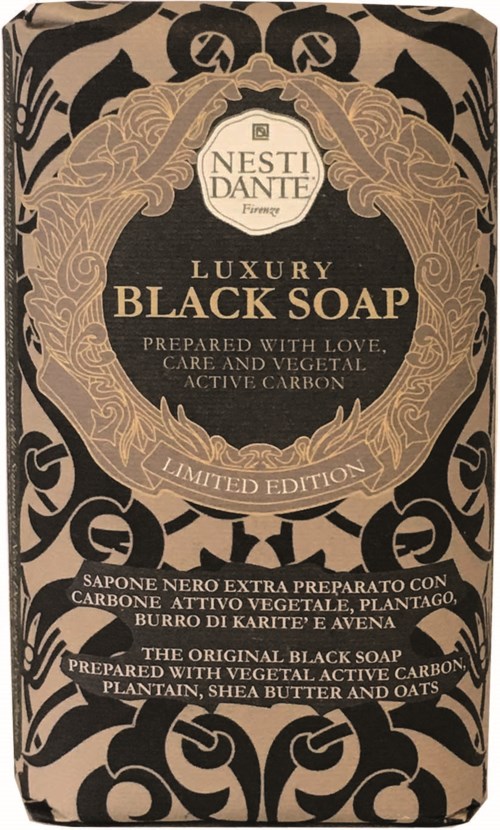 Een luxe zwarte zeepverpakking met goud- en zwarte patronen, met tekst over ingrediënten en editie.