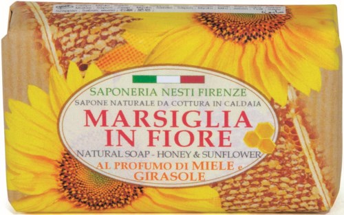 Soap with a sunflower design, honey scent, and bright yellow sunflower images on the packaging.
