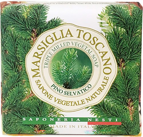 Green pine branches surround a label for Marvisiglia Toscana vegetable soap made in Italy.