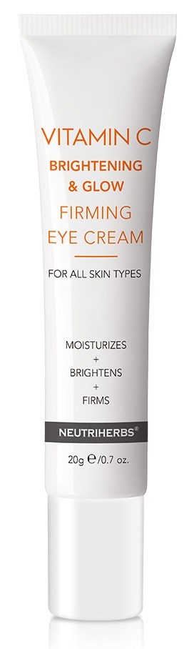 Eine weiße Tube mit Augencreme gekennzeichnet mit Vitamin C Brightening & Glow FIrming Eye Cream, für alle Hauttypen, spendet Feuchtigkeit, hellt auf und strafft.