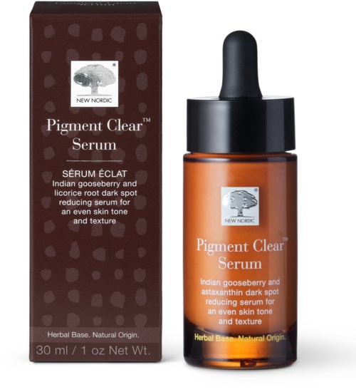 En flaska hudvårdsserum med pipett och matchande förpackning, märkt 'Pigment Clear Serum' för mörka fläckar och hudton.