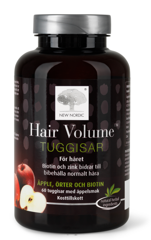En svart flaska med silverlock, märkt 'Hair Volume TUGGISAR' för hår, med bilder av äpple och bär.
