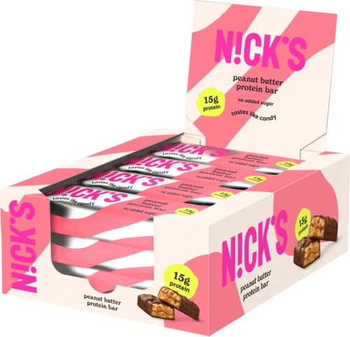 A display box with pink and white stripes holds multiple peanut butter protein bars. The box shows the flavor and nutritional info.