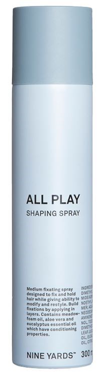 Biała butelka spray'u oznaczona 'ALL PLAY SHAPING SPRAY' z jasnoniebieskim capem.