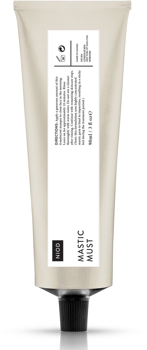 En enkel hvit tube med svart lokk, etikett som viser produktnavn, ingredienser og instruksjoner.