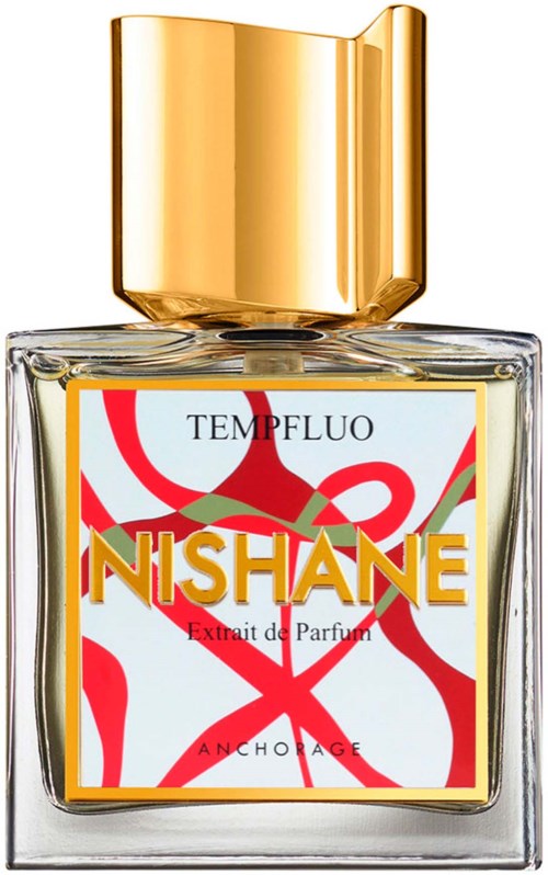 Een glazen parfumfles met gouden dop en kleurrijk abstract label, merk Nishane Extrait de Parfum.