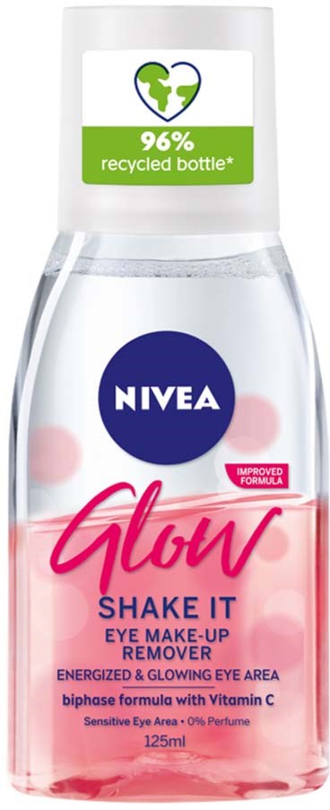 A small transparent bottle with pink liquid, labeled 'Glow Shake It' eye makeup remover, 125ml, with a green sticker promoting recycled bottles.