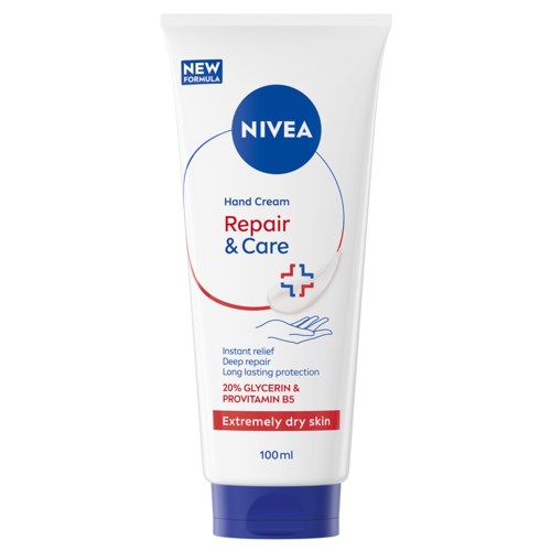 En vit tub med Nivea handcreme kallad Repair & Care med blå, röd och vit text, för mycket torr hud.