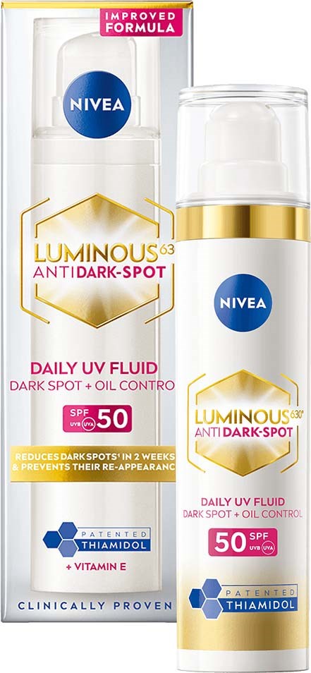 A skincare product with SPF 50 for dark spots and oil control, in a white and gold bottle with a box.