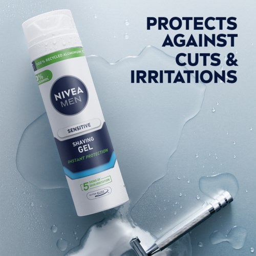 A Nivea Men shaving gel tube with a razor lying on a wet surface. Text shows protection against cuts and irritations.