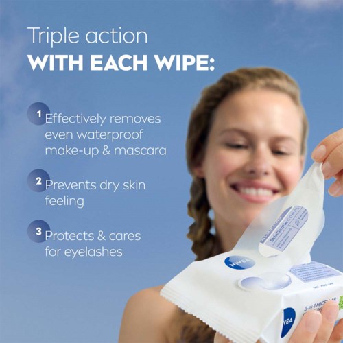 The image shows a woman with a smile holding a wipe package, describing its benefits for makeup, skin, and eyelashes.