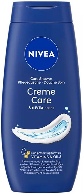 Blue bottle of Nivea Creme Care shower gel with water splash design and text about skin protection and vitamins.