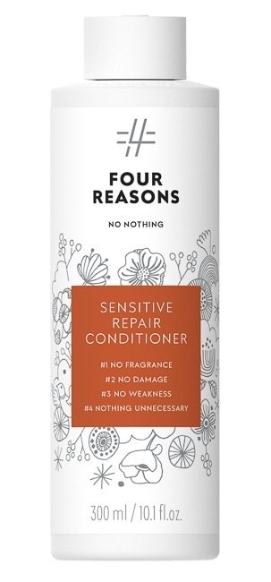 Een witte fles met label 'Four Reasons Sensitive Repair Conditioner' zonder geur, schade, zwakte en onnodige ingrediënten.